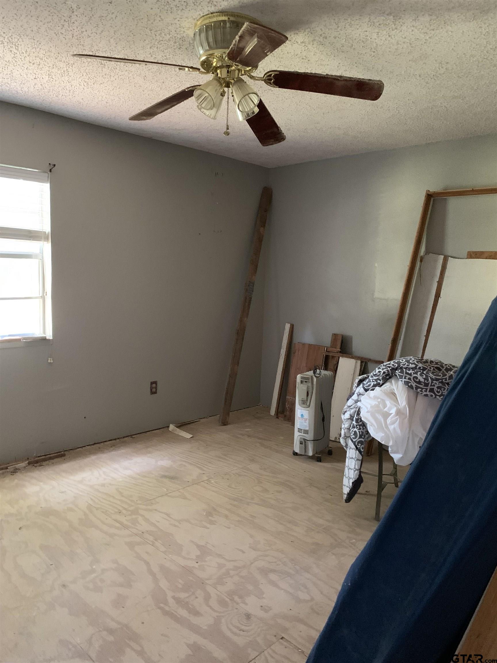 502 County Road 3264 Quitman, TX 75783 - Photo 32 of 37 a room with lots of storage and utility