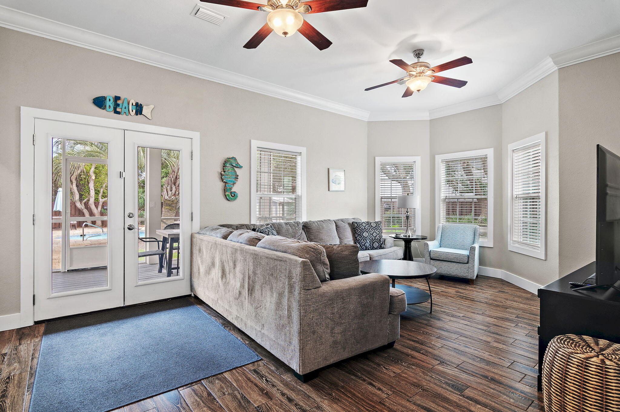 78 Pelican Glide Lane Inlet Beach, FL 32461 - Photo 12 of 61 a living room with furniture and a flat screen tv