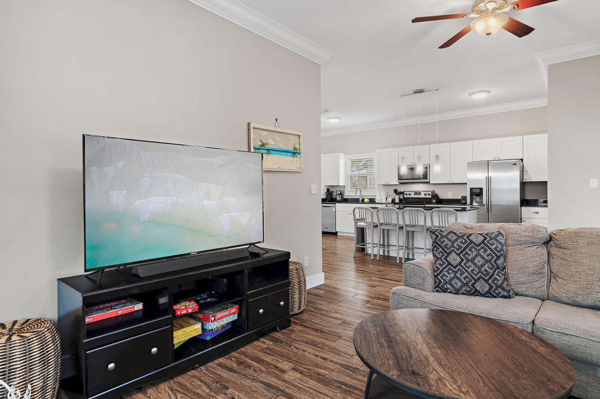78 Pelican Glide Lane Inlet Beach, FL 32461 - Photo 13 of 61 a living room with furniture and a flat screen tv
