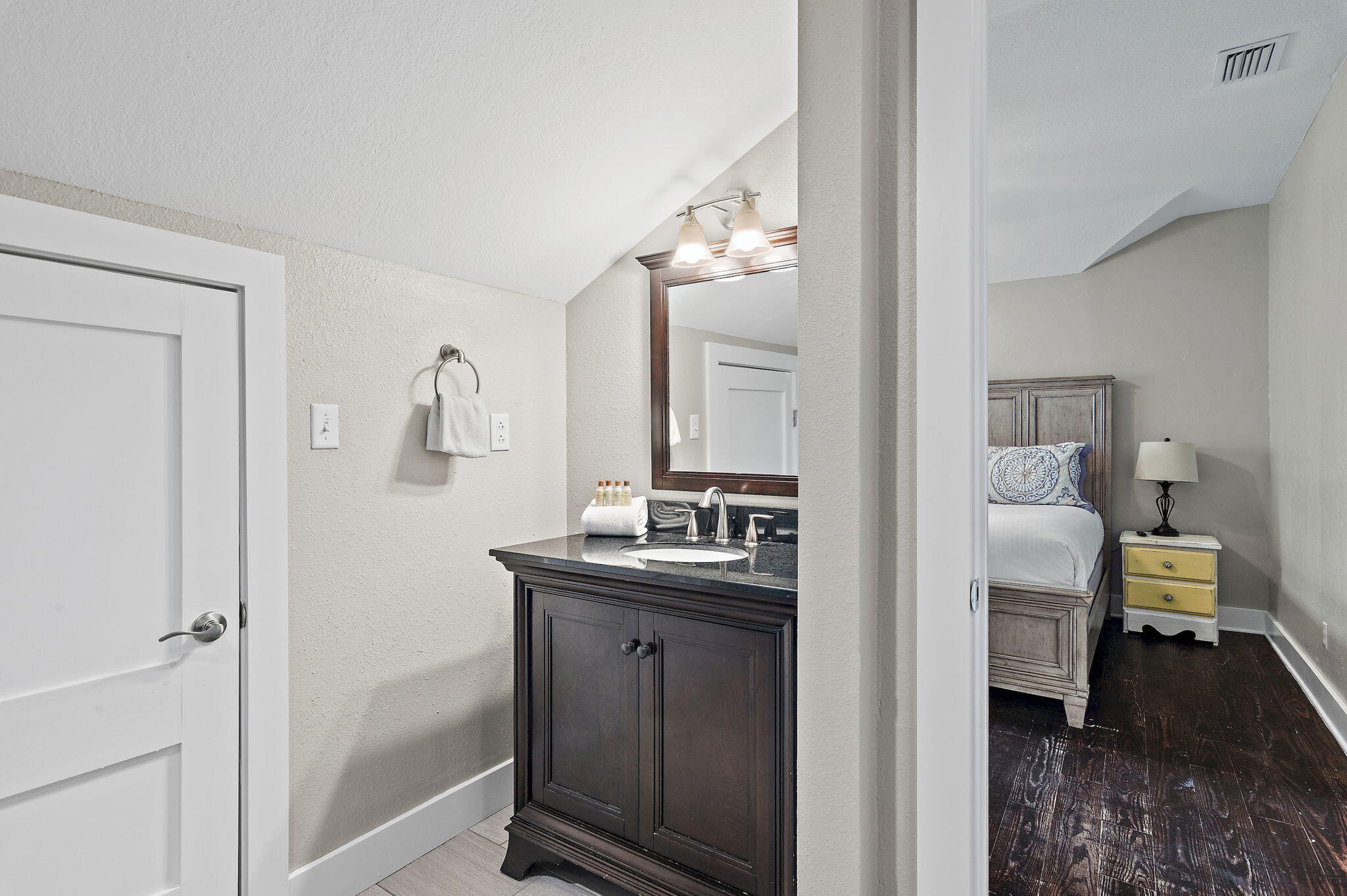 78 Pelican Glide Lane Inlet Beach, FL 32461 - Photo 25 of 53 a en suite bathroom with a sink a mirror and a shower