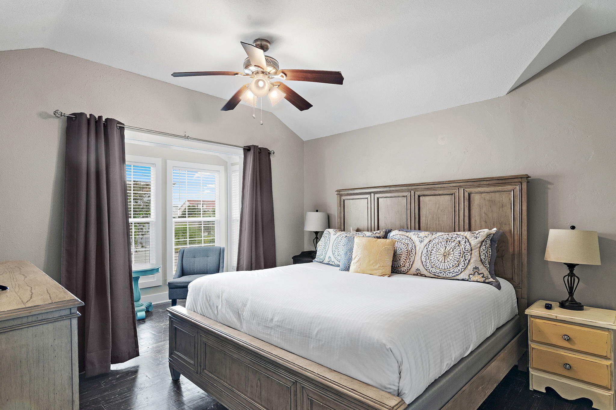 78 Pelican Glide Lane Inlet Beach, FL 32461 - Photo 29 of 53 a bedroom with a large bed and a chandelier