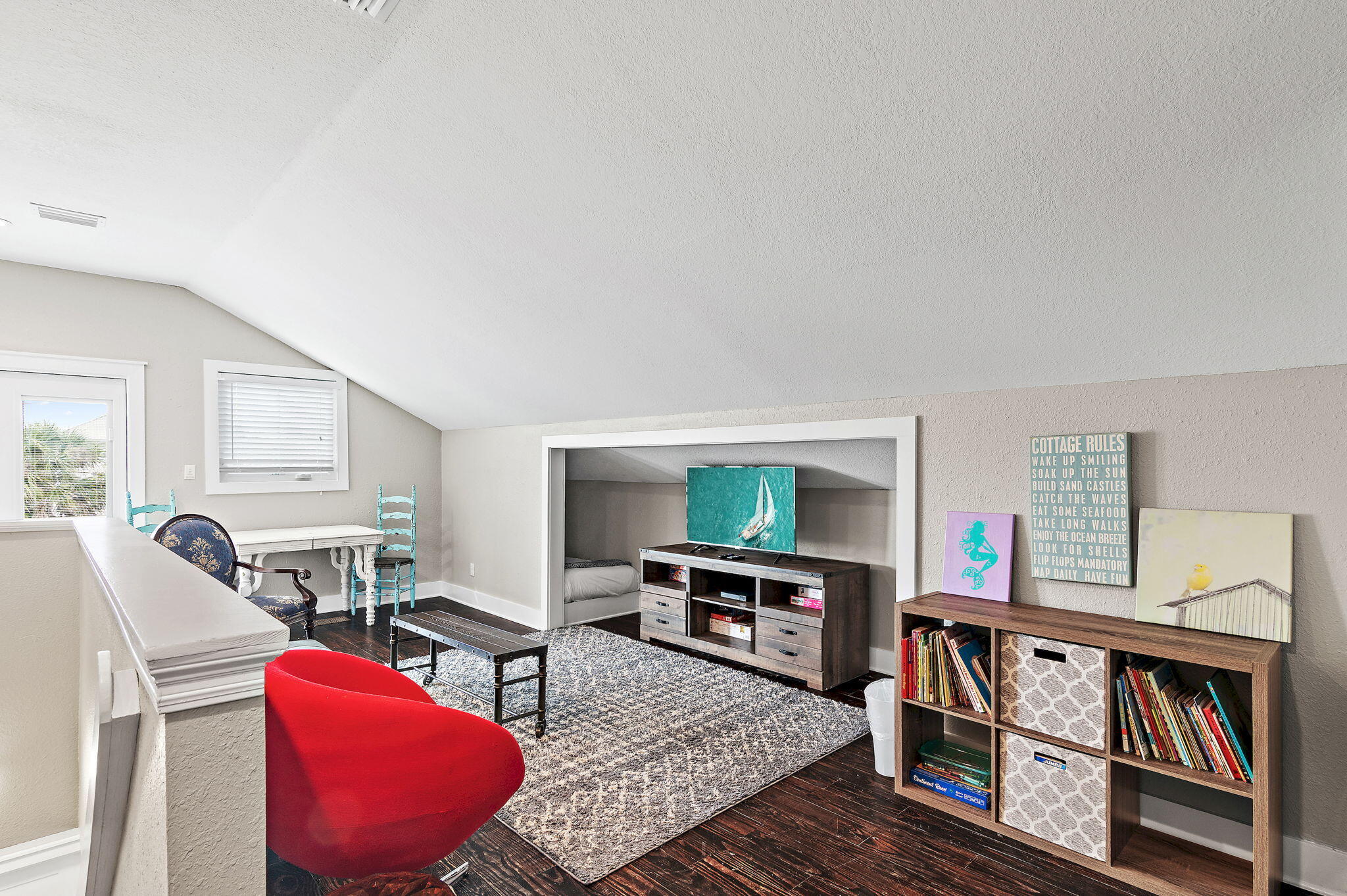 78 Pelican Glide Lane Inlet Beach, FL 32461 - Photo 30 of 53 a living room with furniture a rug and a window
