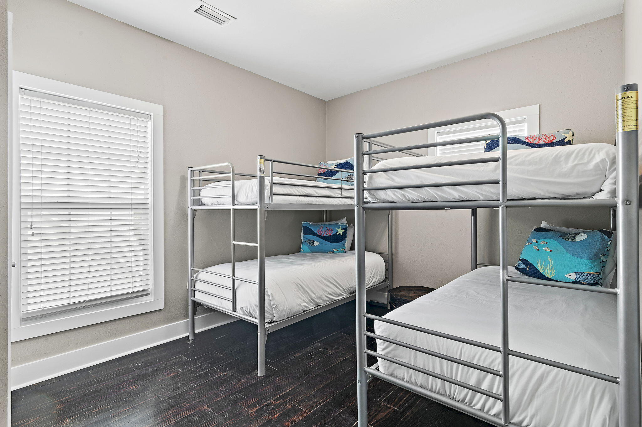 78 Pelican Glide Lane Inlet Beach, FL 32461 - Photo 40 of 61 a bedroom with a bed and wooden floor