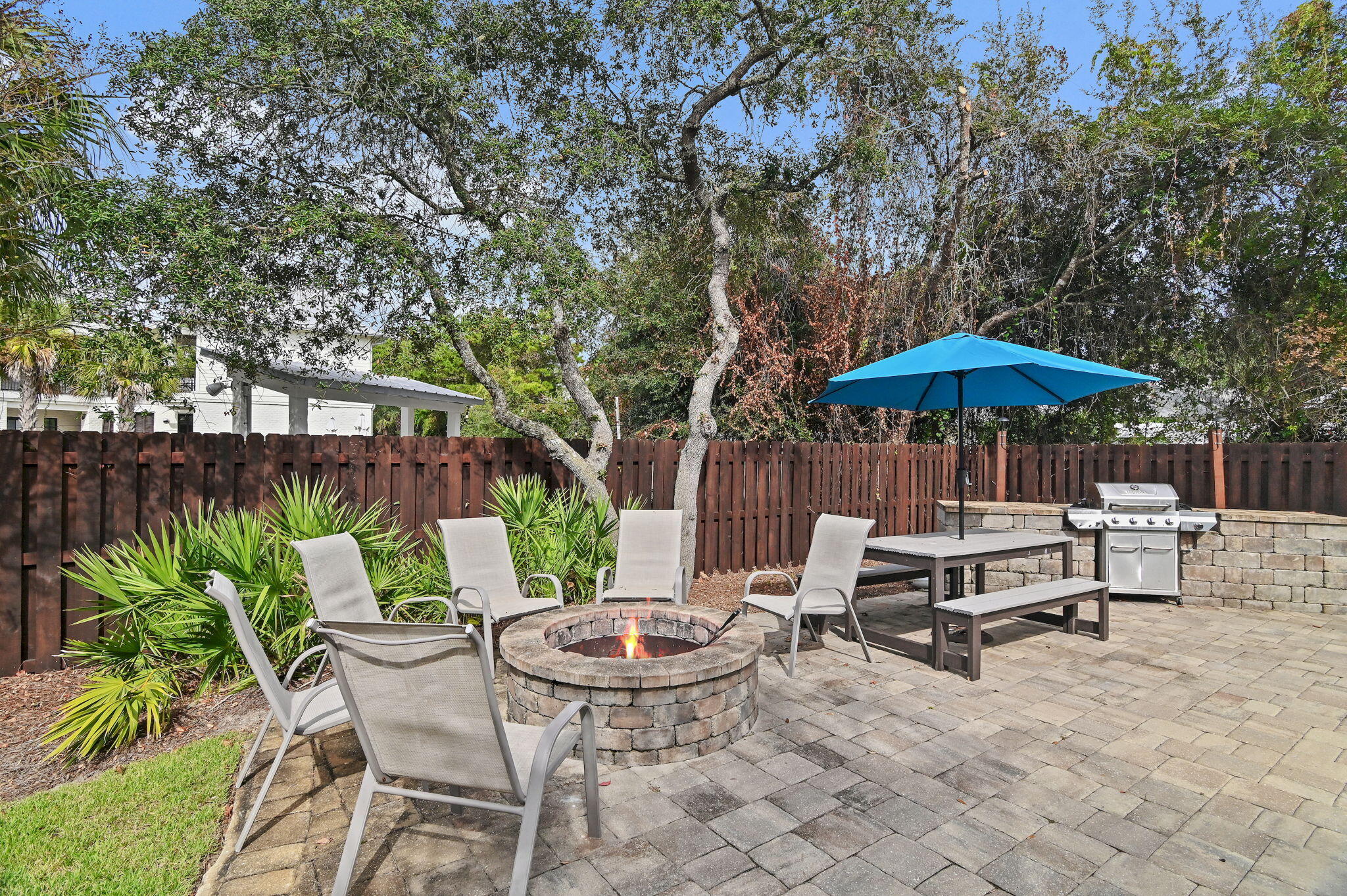 78 Pelican Glide Lane Inlet Beach, FL 32461 - Photo 44 of 61 a view of backyard with seating space and wooden fence