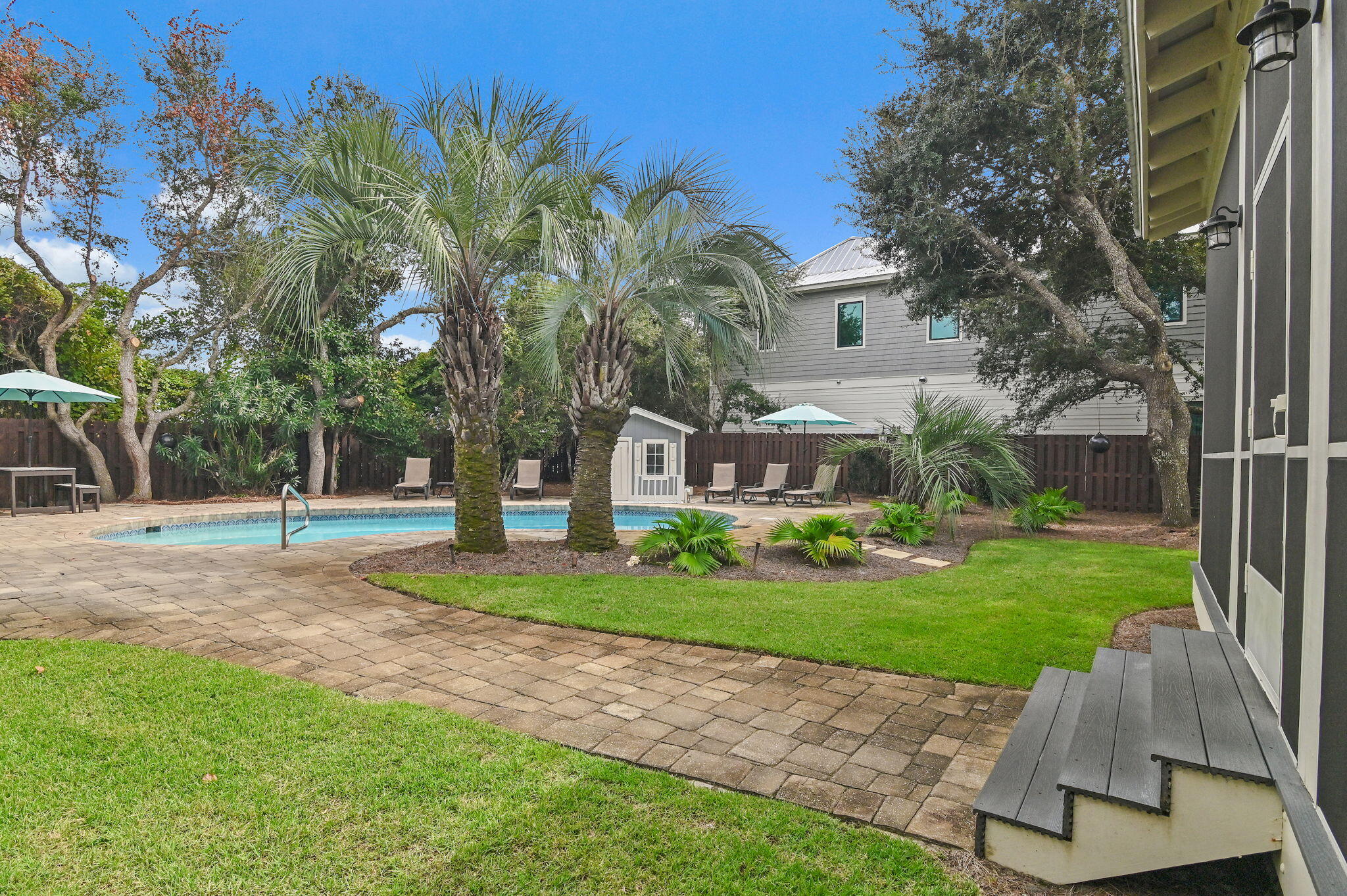 78 Pelican Glide Lane Inlet Beach, FL 32461 - Photo 45 of 61 a front view of a house with garden