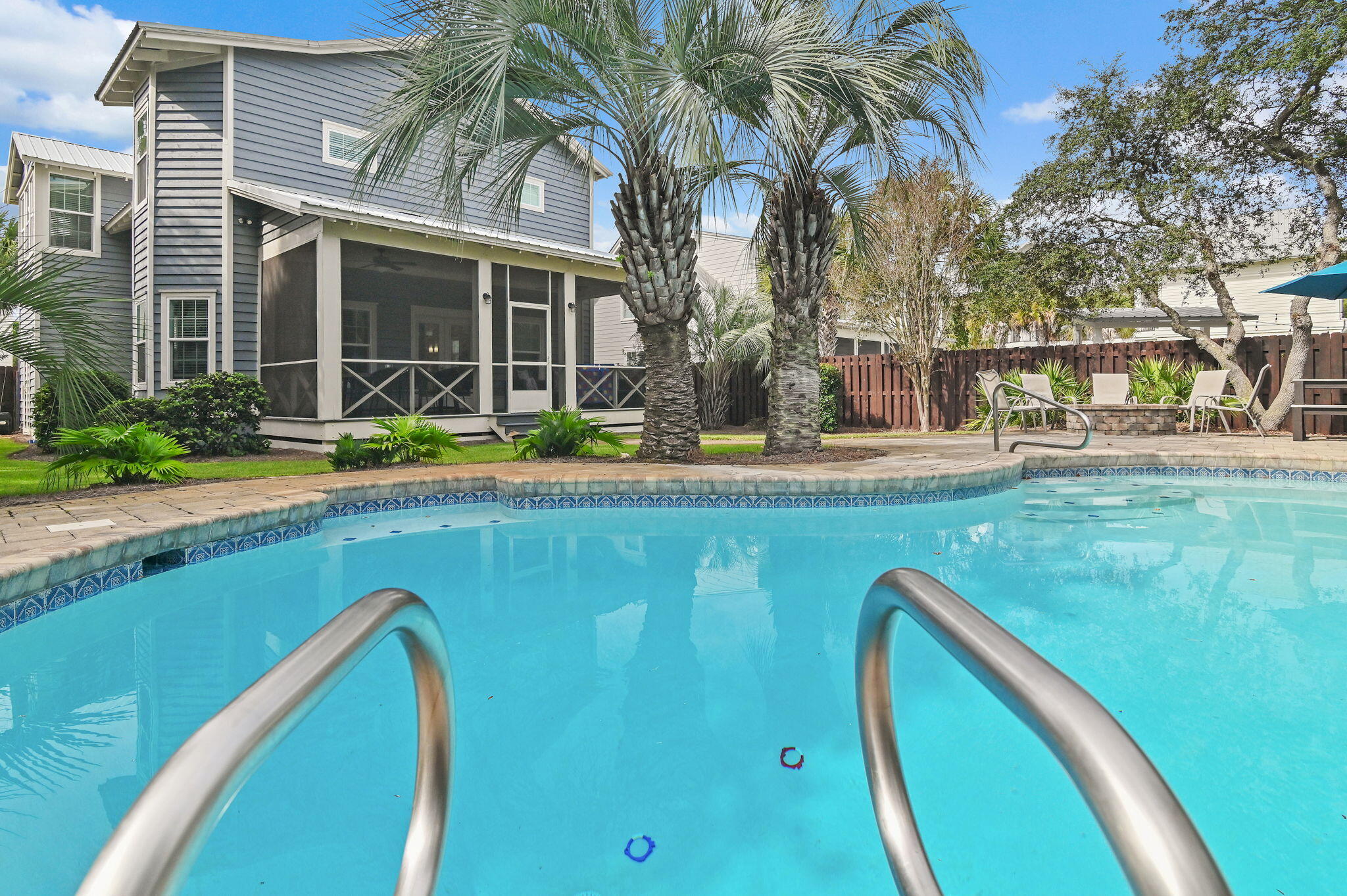 78 Pelican Glide Lane Inlet Beach, FL 32461 - Photo 49 of 61 a view of swimming pool with outdoor seating and deck