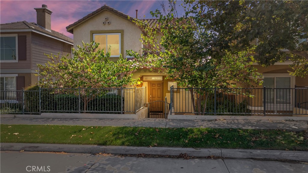 2865 Watermount Street Riverside, CA 92501 - Photo 1 of 1 a front view of a house with a garden