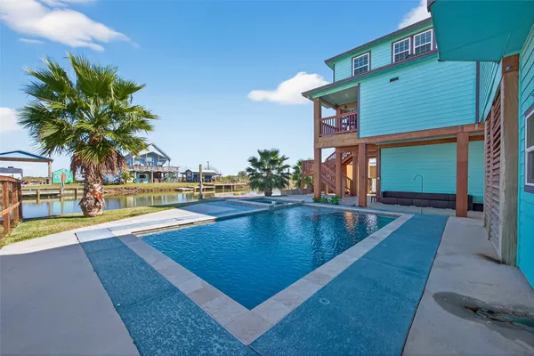 a view of a house with swimming pool