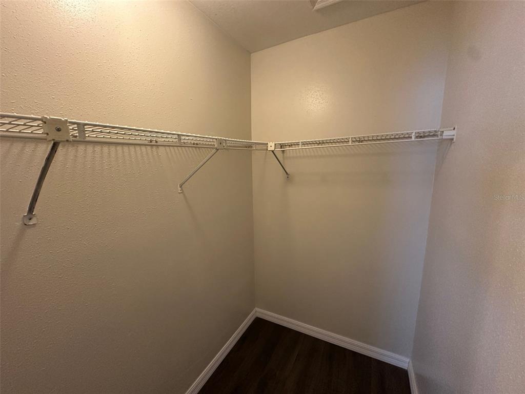 626 Cambridge Way, Unit 98 Altamonte Springs, FL 32714 - Photo 12 of 15 a view of a room with racks on the wall