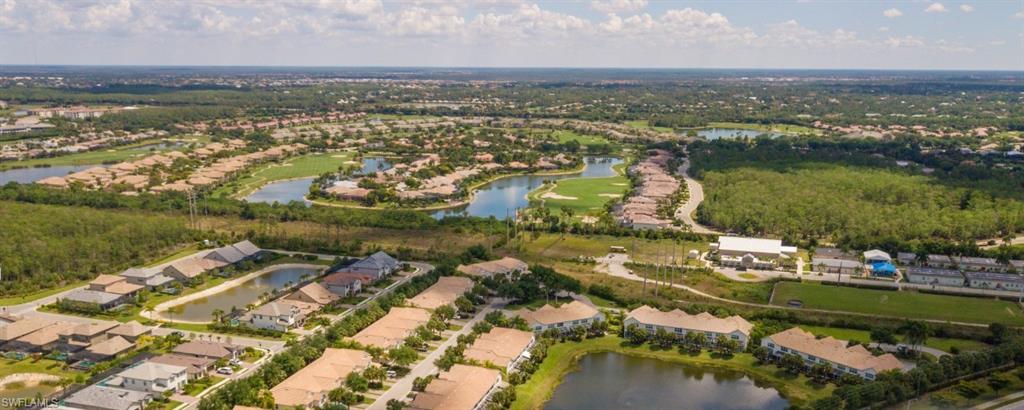 16097 Ravina Way, Unit 36 Naples, FL 34110 - Photo 19 of 19 an aerial view of residential houses with outdoor space and lake view