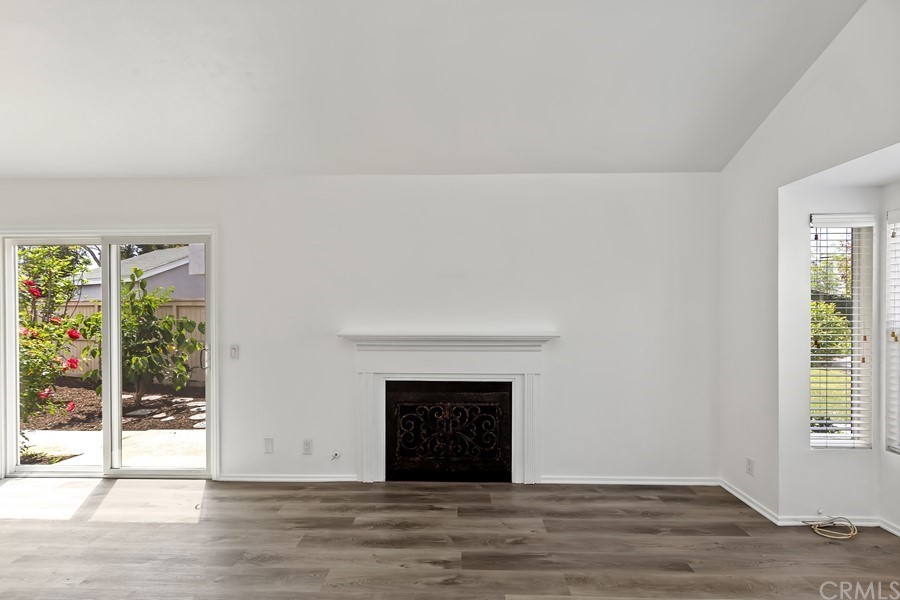 20 Wildwheat Irvine, CA 92614 - Photo 16 of 29 a view of an empty room with wooden floor and a window