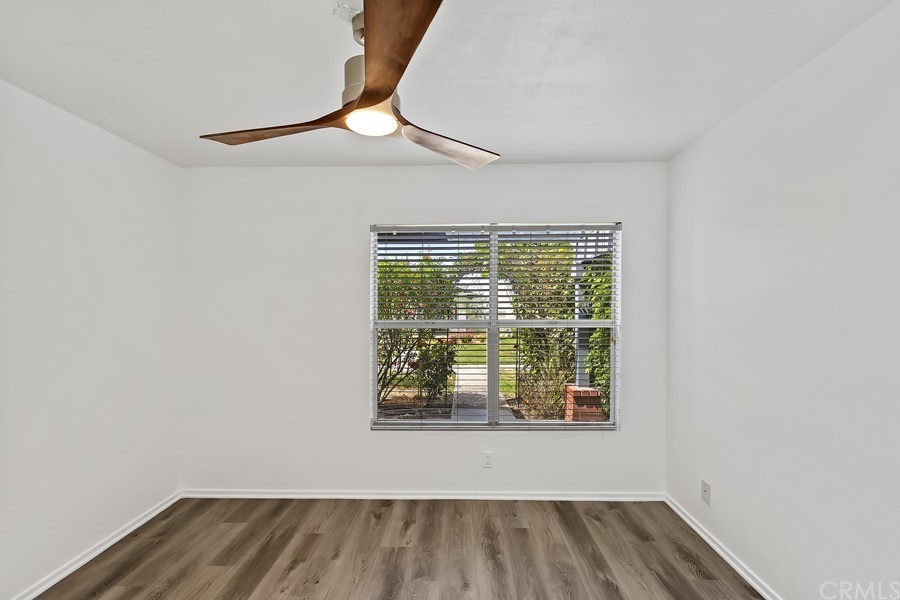 20 Wildwheat Irvine, CA 92614 - Photo 17 of 29 an empty room with wooden floor and windows