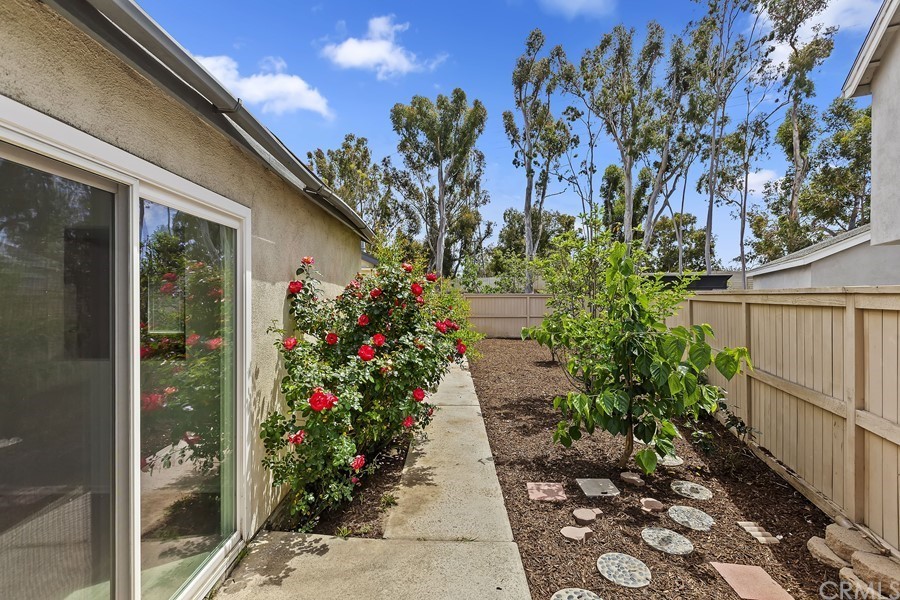 20 Wildwheat Irvine, CA 92614 - Photo 23 of 29 a view of a pathway with a flower garden