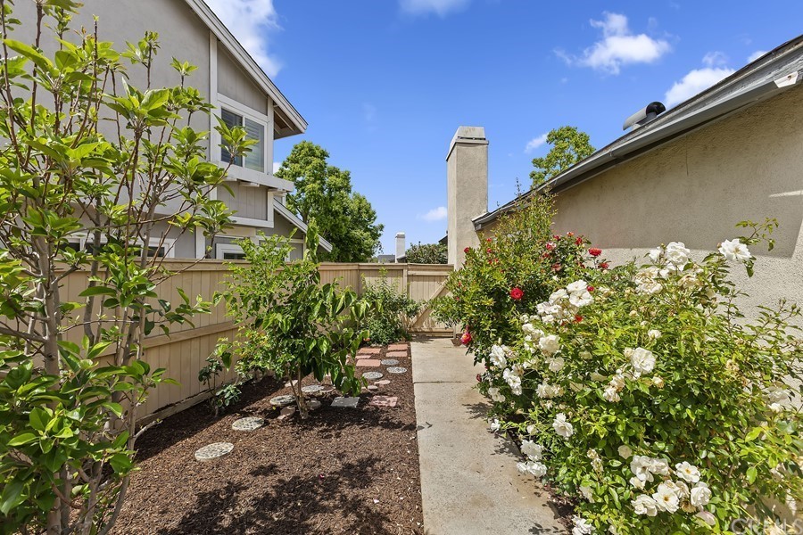20 Wildwheat Irvine, CA 92614 - Photo 24 of 29 a backyard of a house with a yard and outdoor seating