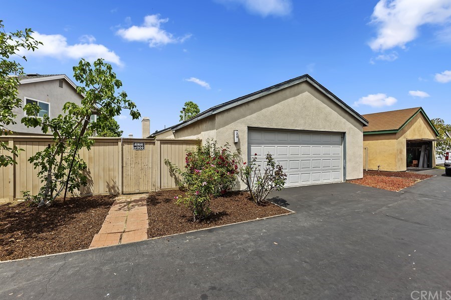 20 Wildwheat Irvine, CA 92614 - Photo 28 of 29 a view of a house with a yard