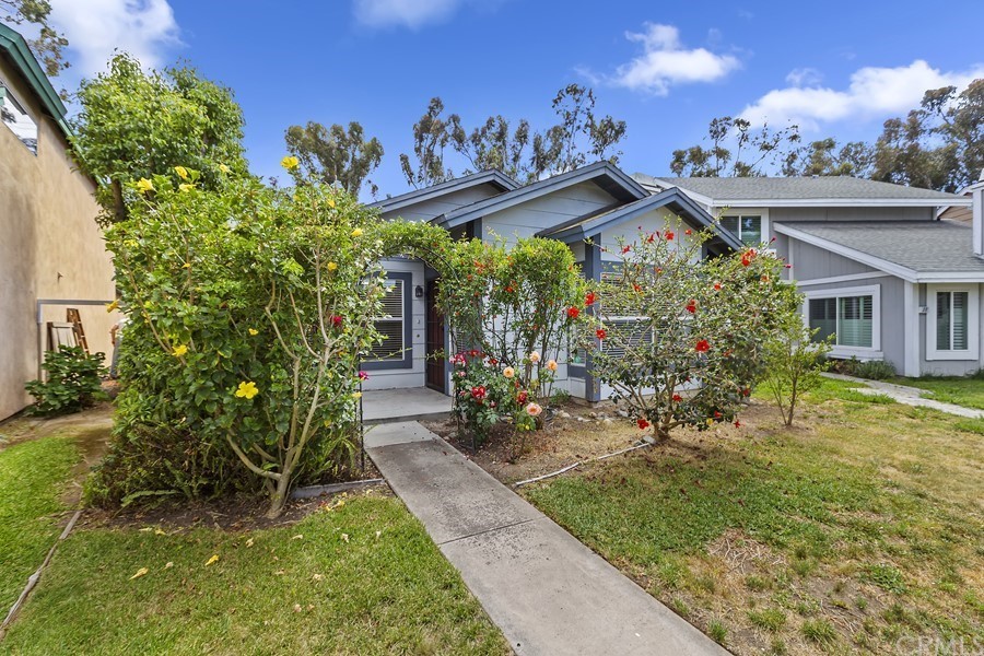 20 Wildwheat Irvine, CA 92614 - Photo 3 of 29 a view of a house with a big yard and potted plants