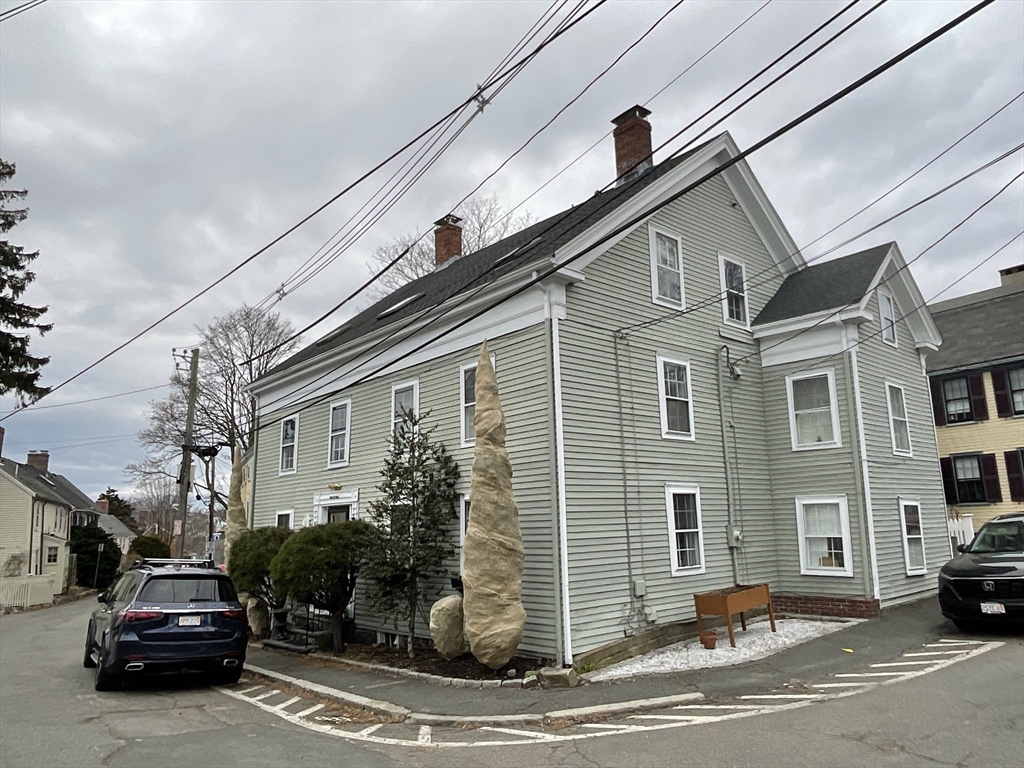 a car parked in front of a house