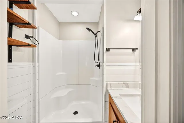 a bathroom with a bathtub
