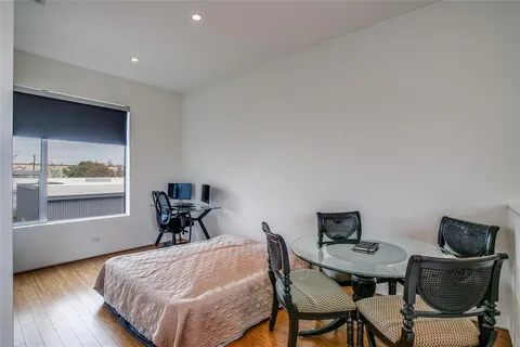 a workspace with furniture and window
