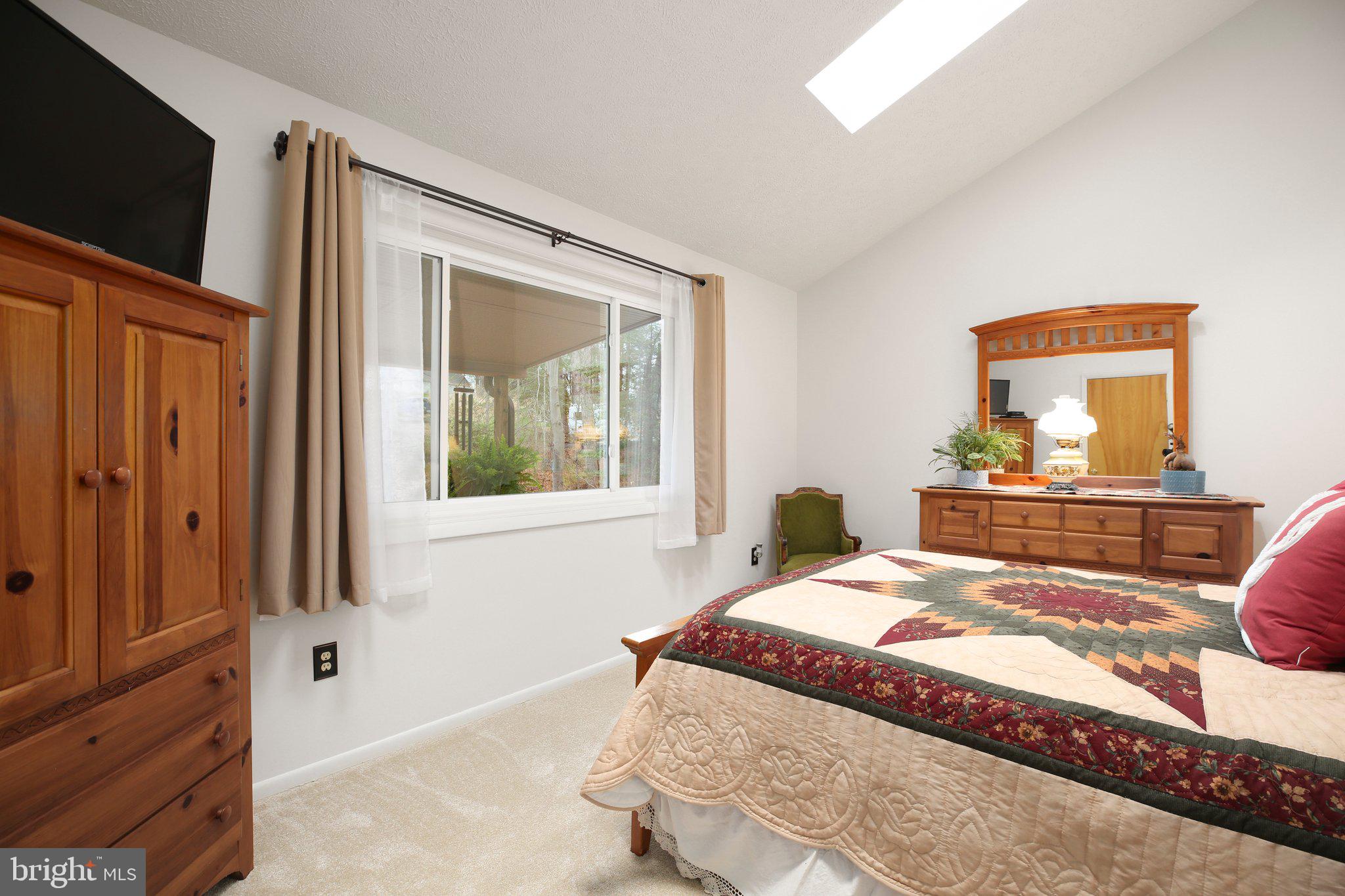 10831 Moore Drive Manassas, VA 20111 - Photo 11 of 52 a bedroom with a bed and a window