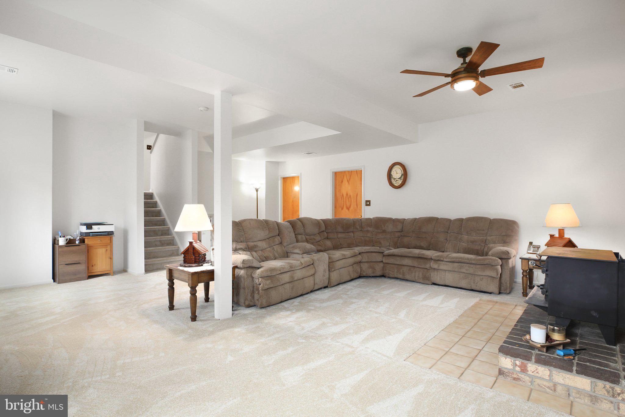 10831 Moore Drive Manassas, VA 20111 - Photo 15 of 52 a living room with furniture