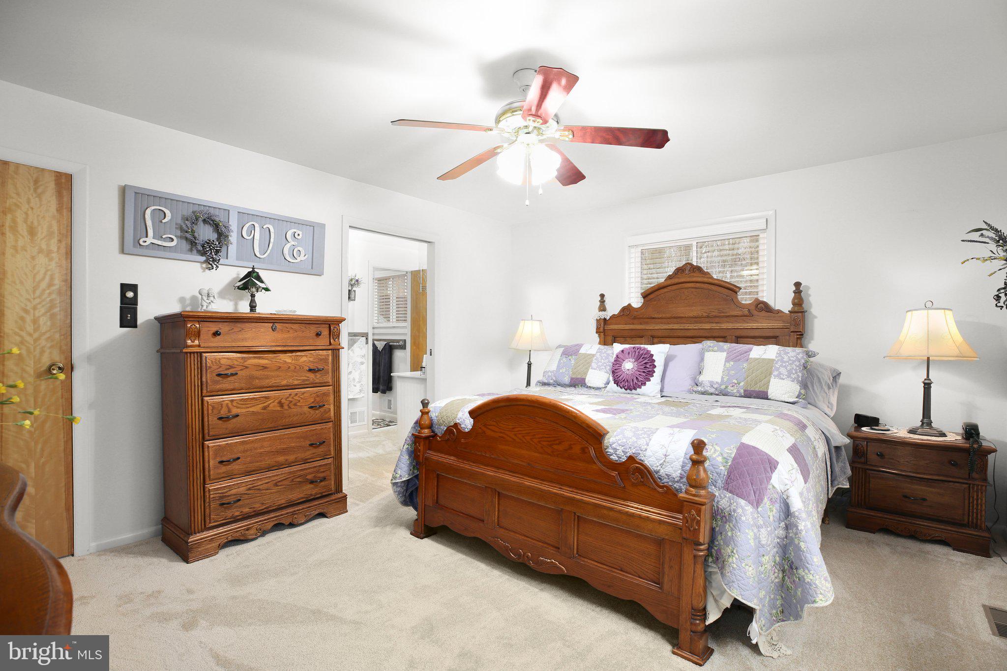 10831 Moore Drive Manassas, VA 20111 - Photo 28 of 52 a bedroom with a bed and closet