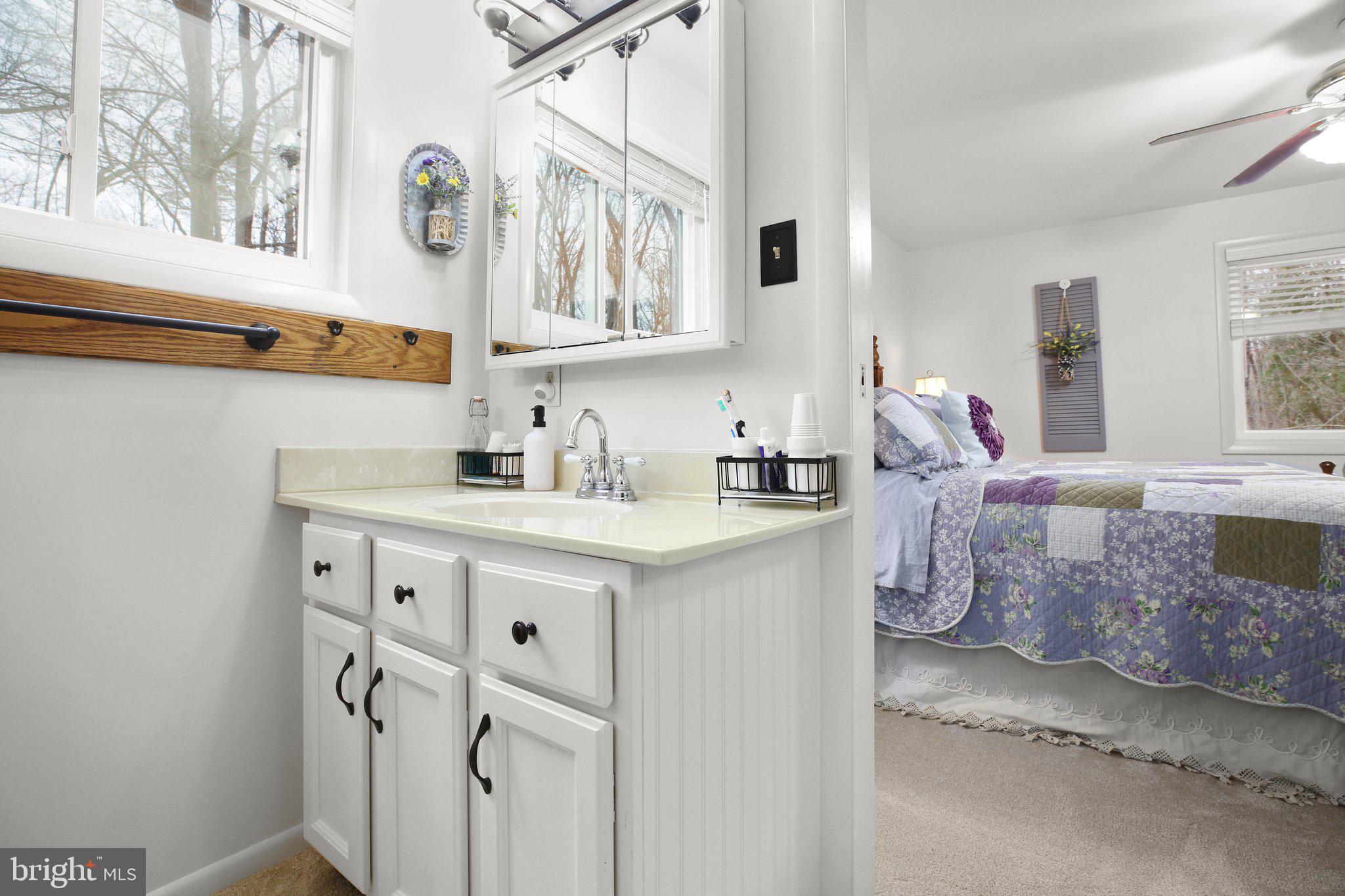 10831 Moore Drive Manassas, VA 20111 - Photo 31 of 52 a kitchen with cabinets and window