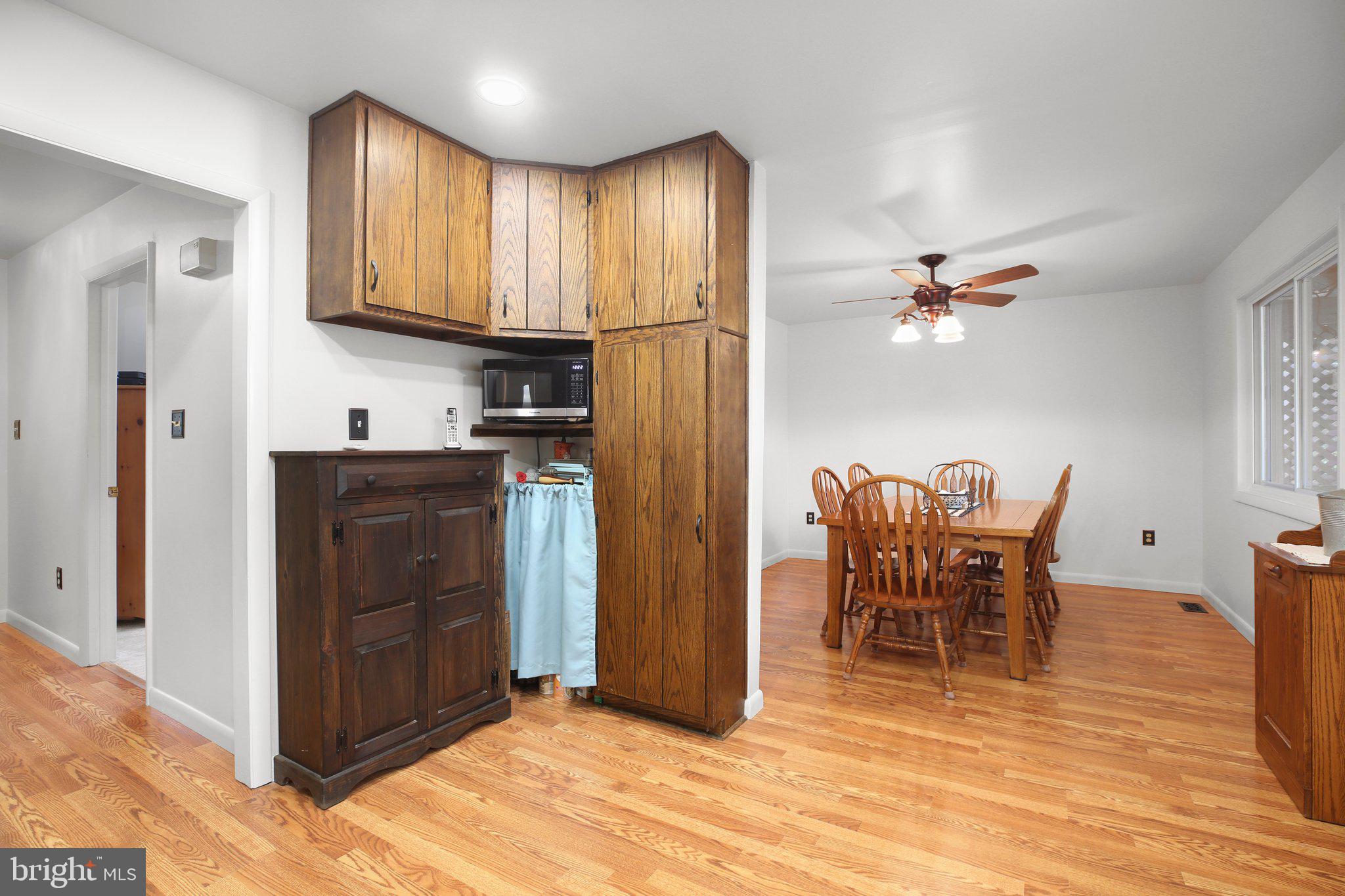 10831 Moore Drive Manassas, VA 20111 - Photo 4 of 52 a view of kitchen with granite countertop cabinets table and chairs