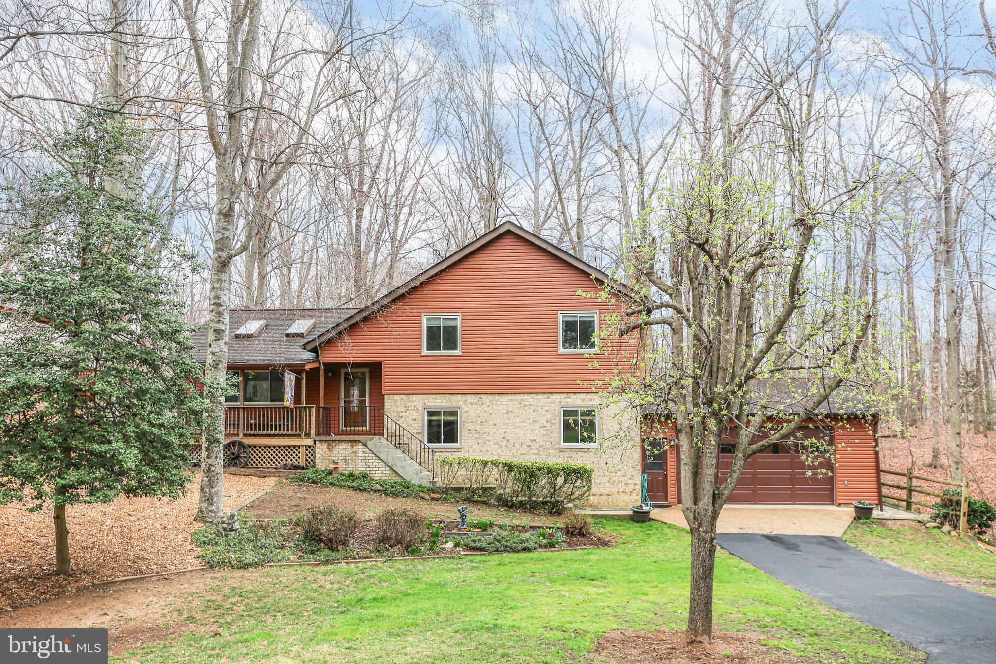 10831 Moore Drive Manassas, VA 20111 - Photo 49 of 52 a view of a yard in front of a house