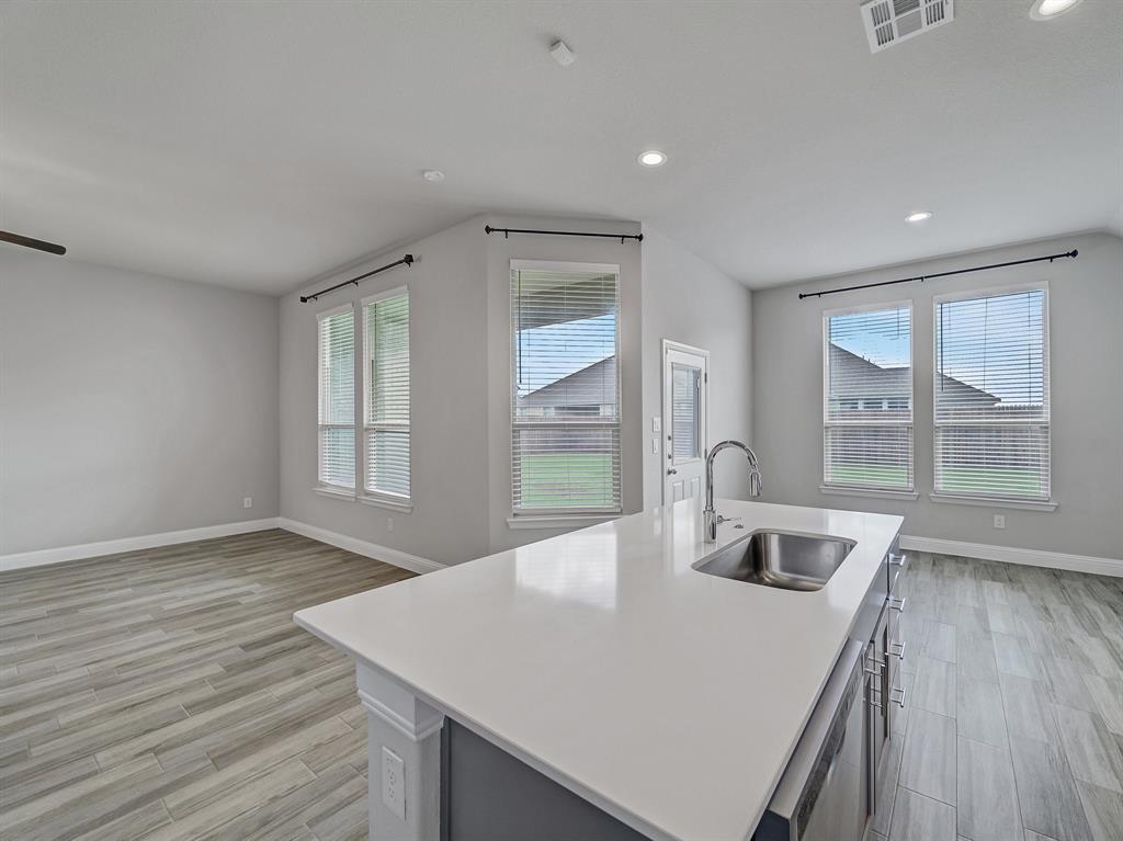 3443 April Breeze Trail Grand Prairie, TX 76065 - Photo 10 of 29 a view of a living room and dining room