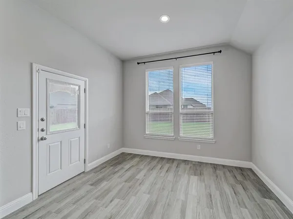 a view of a living room and dining room
