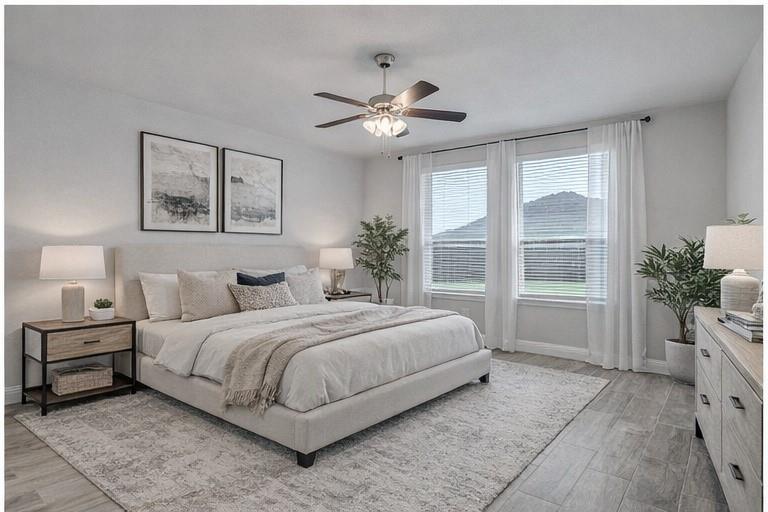 3443 April Breeze Trail Grand Prairie, TX 76065 - Photo 13 of 29 a bedroom with a large bed and a window