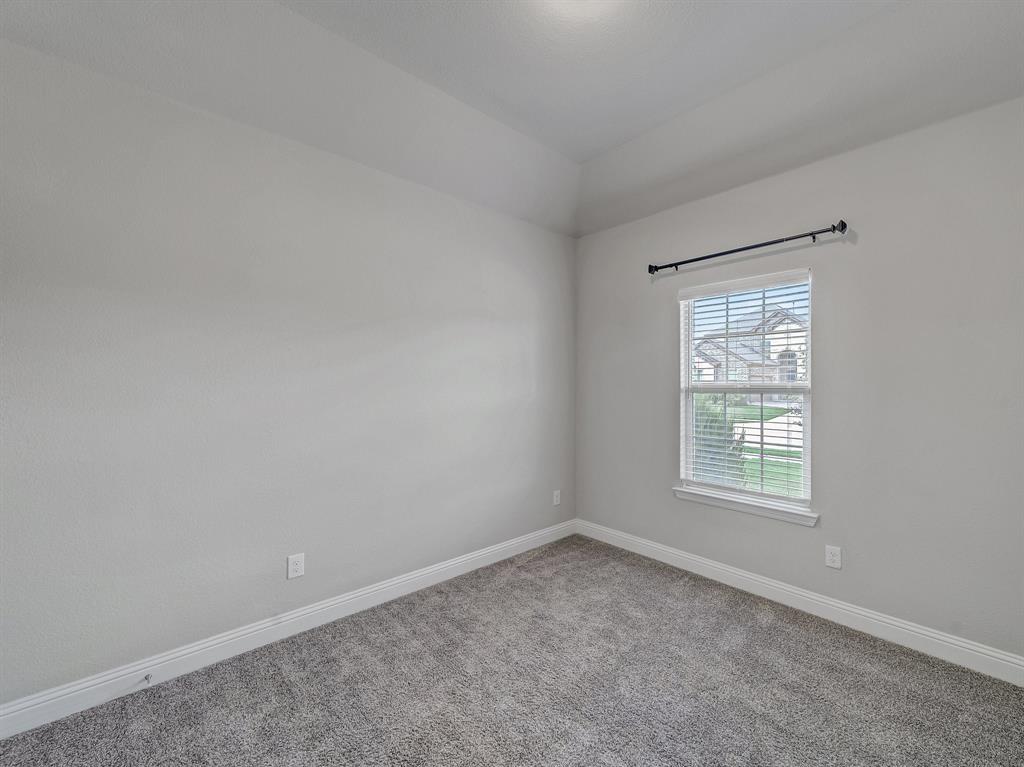 3443 April Breeze Trail Grand Prairie, TX 76065 - Photo 21 of 29 an empty room with a window