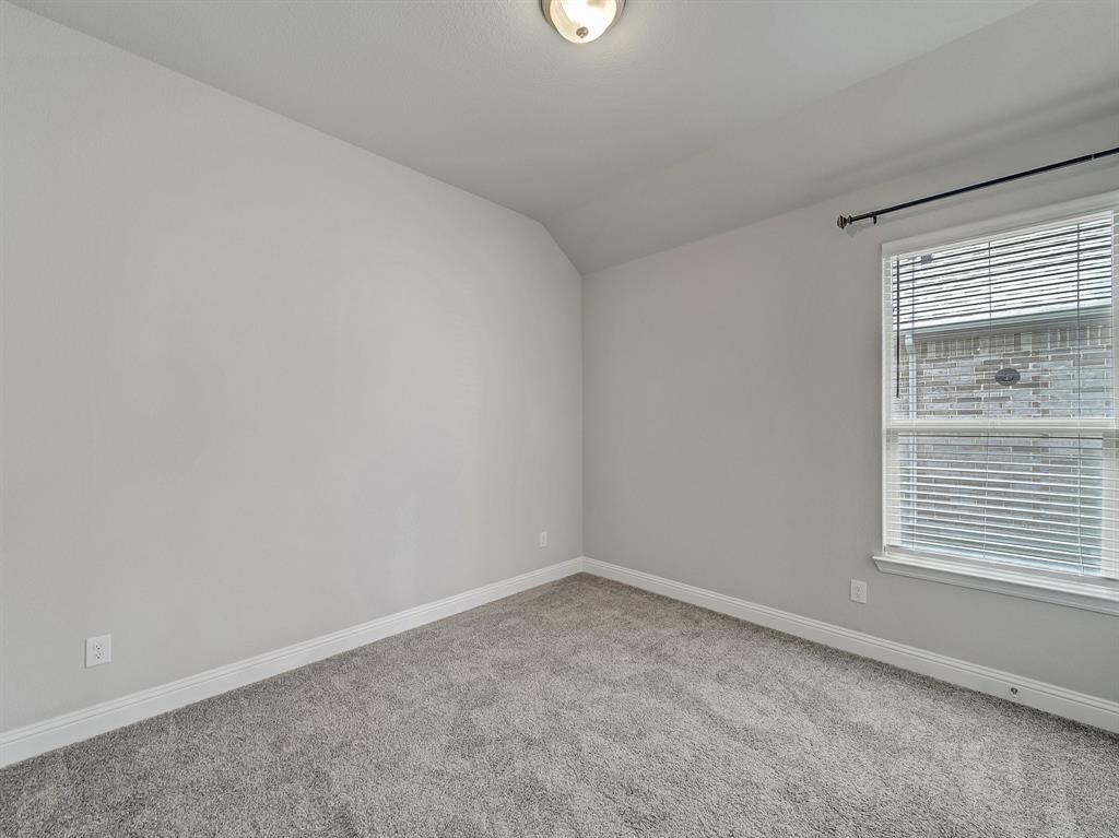 3443 April Breeze Trail Grand Prairie, TX 76065 - Photo 22 of 29 an empty room with a window