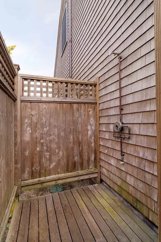 a view of outdoor space with wooden floor