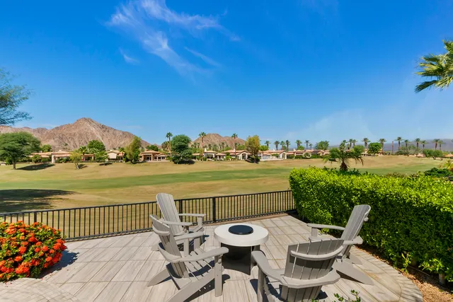 a view of a terrace with furniture