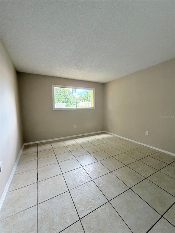 908 Lake Destiny Road, Unit B Altamonte Springs, FL 32714 - Photo 7 of 16 an empty room with windows
