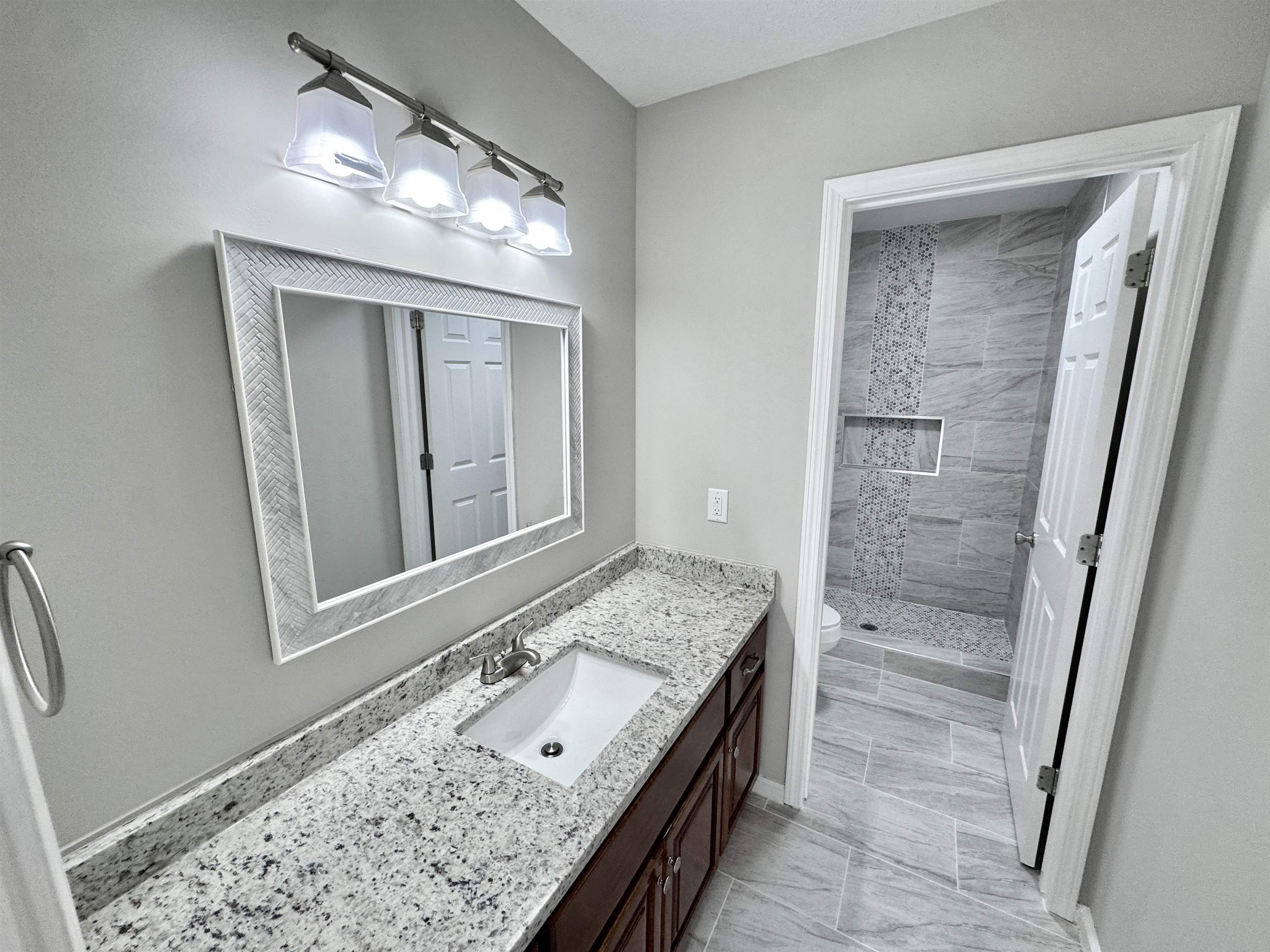 526 Stone Ridge Pinson, TN 38366 - Photo 17 of 39 Full bath with vanity and a stall shower