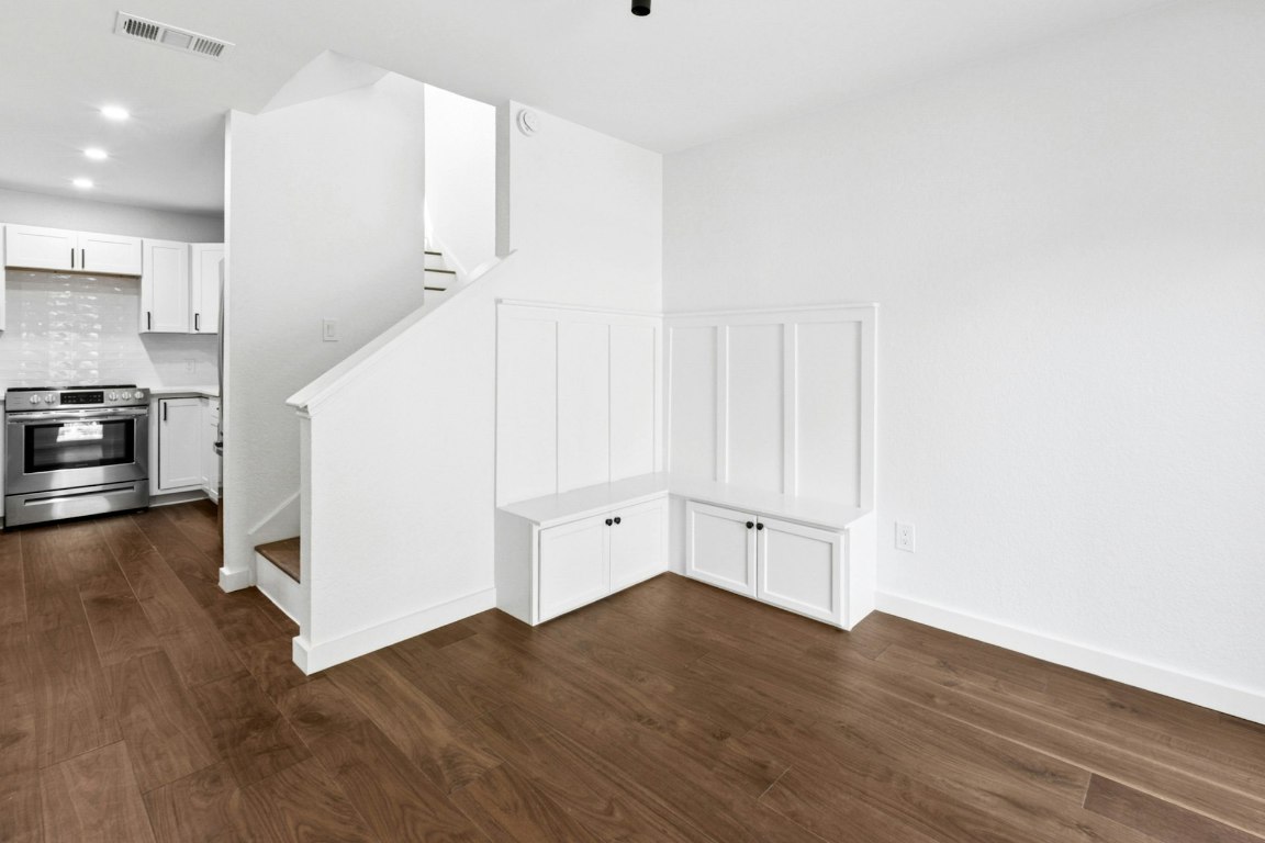 2129 Redwing Way Round Rock, TX 78664 - Photo 14 of 27 a view of a kitchen with wooden floor and electronic appliances