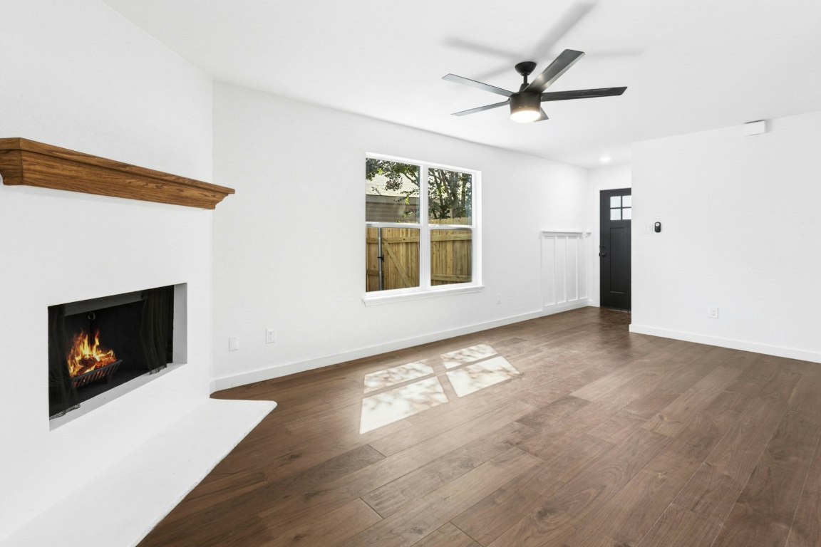 2129 Redwing Way Round Rock, TX 78664 - Photo 7 of 27 a view of a livingroom with a fireplace and window