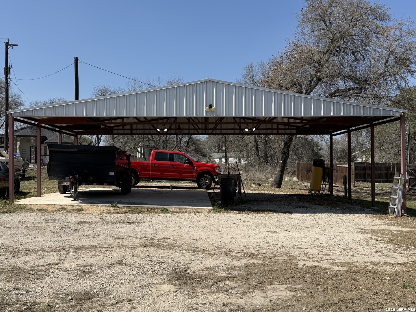 4811 Treebark Lane Elmendorf, TX 78112 - Photo 2 of 5 a view of a car parking garage