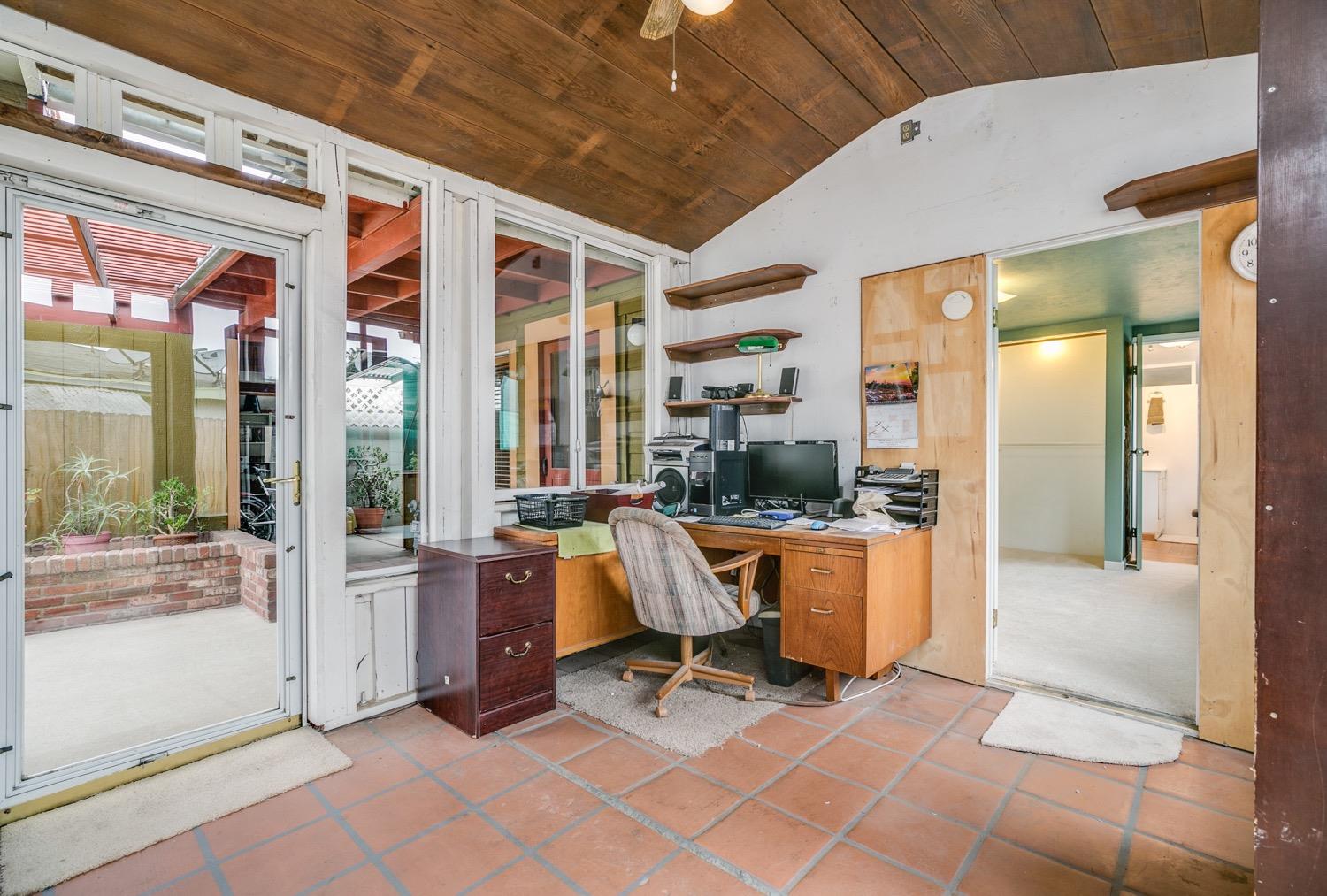 267 Burnham Road Oak View, CA 93022 - Photo 11 of 20 a view of living room kitchen with furniture and large windows