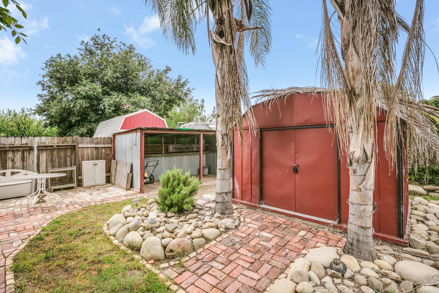 267 Burnham Road Oak View, CA 93022 - Photo 16 of 20 a view of a house with backyard and sitting area