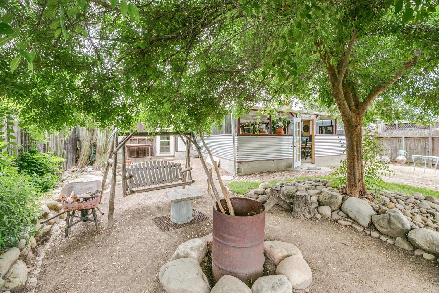 267 Burnham Road Oak View, CA 93022 - Photo 17 of 20 a view of backyard with outdoor seating and trees