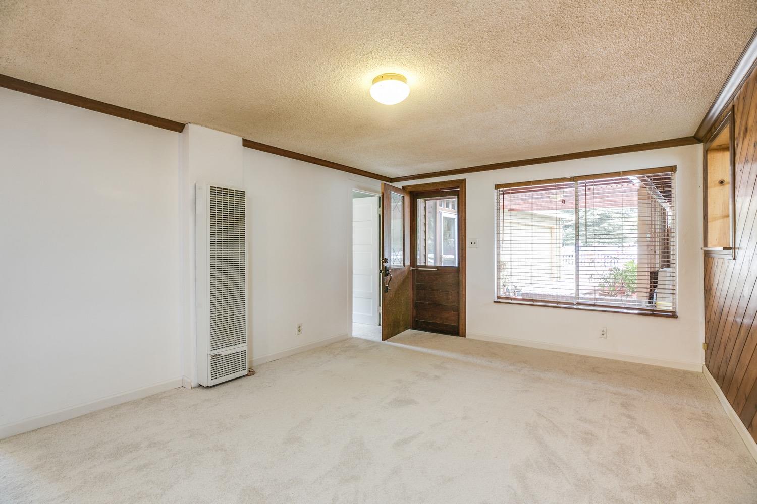 267 Burnham Road Oak View, CA 93022 - Photo 4 of 20 a view of an empty room with a window
