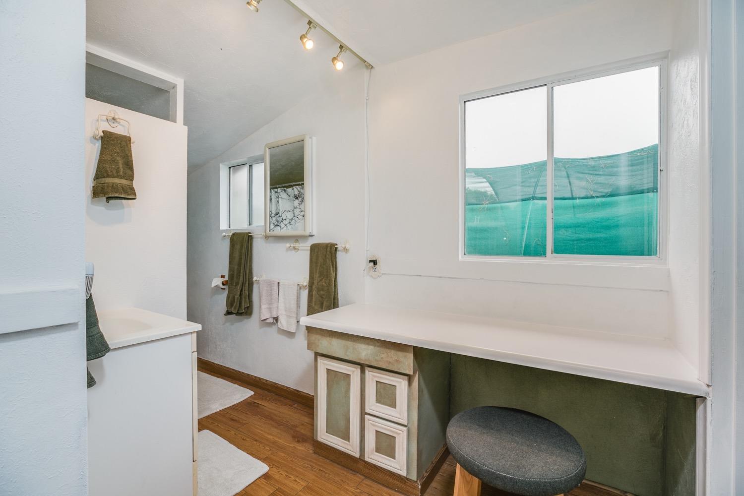 267 Burnham Road Oak View, CA 93022 - Photo 10 of 20 a kitchen with a table chairs and a window