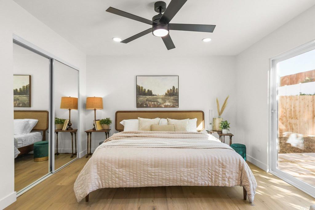 463 Parkbrook Street Spring Valley, CA 91977 - Photo 25 of 37 a bedroom with a bed and window