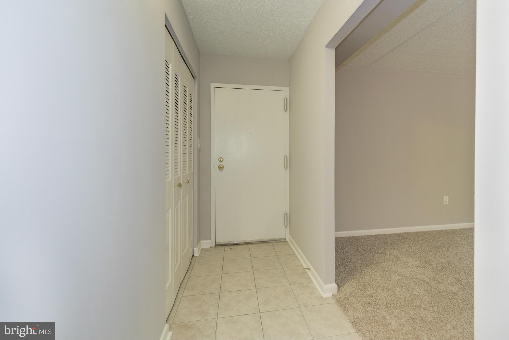 11727 Ledura Court, Unit T2 Reston, VA 20191 - Photo 2 of 18 a view of room with walk in closet
