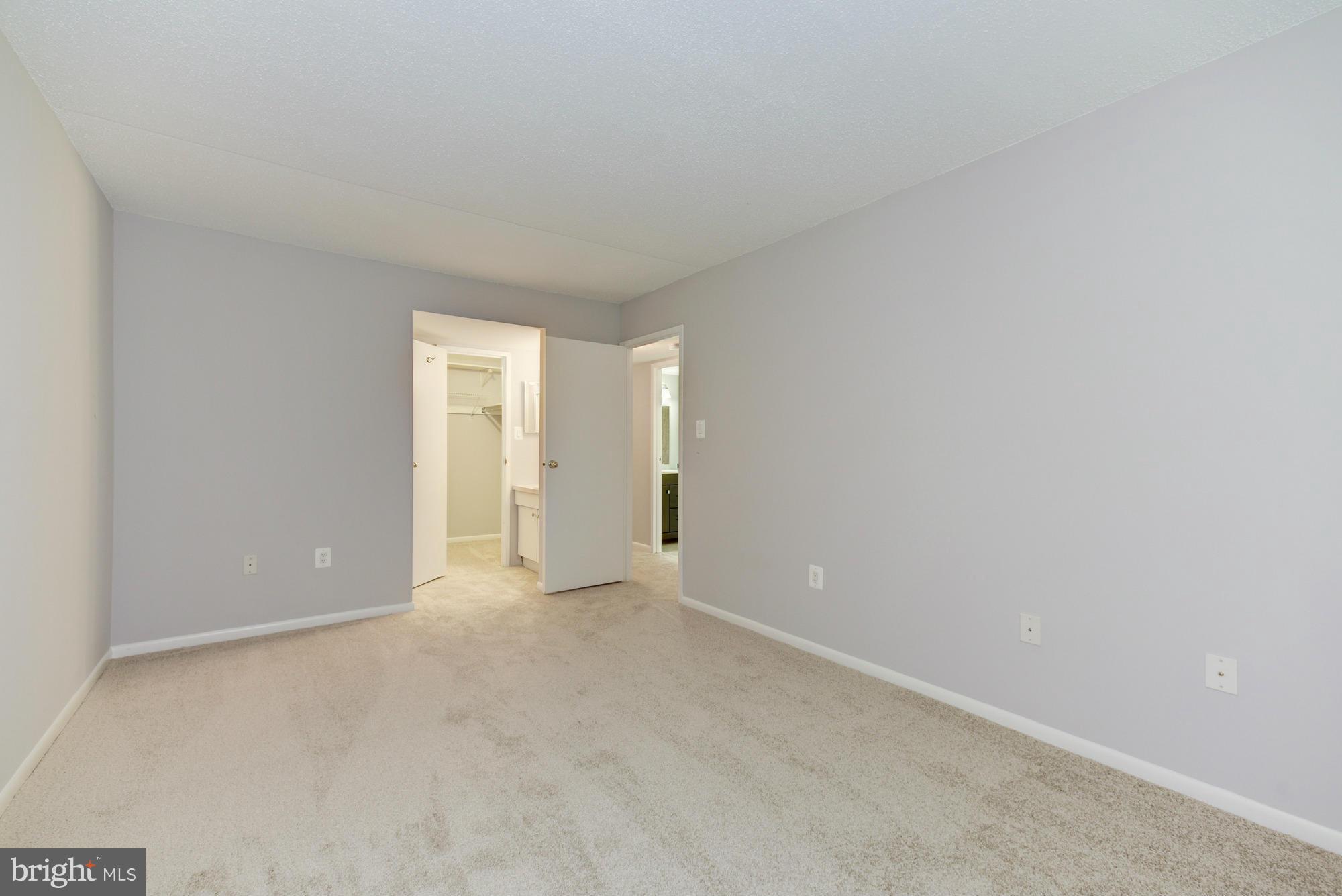 11727 Ledura Court, Unit T2 Reston, VA 20191 - Photo 11 of 18 a view of an empty room with window