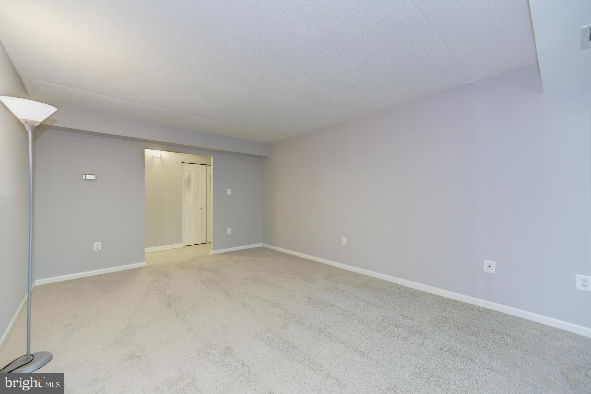 11727 Ledura Court, Unit T2 Reston, VA 20191 - Photo 5 of 18 a view of an empty room with a window